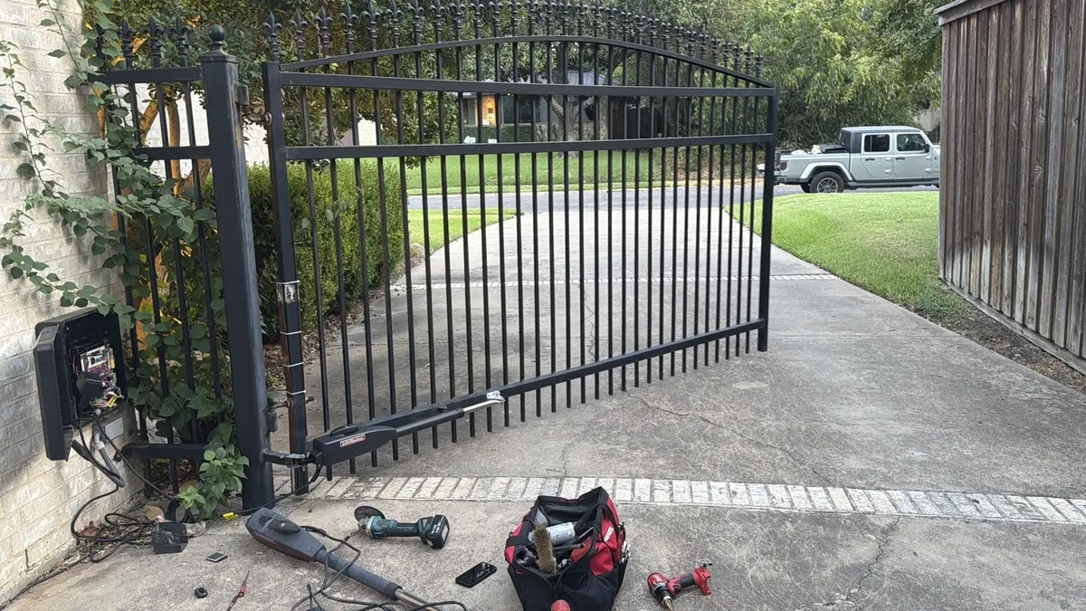 View of the swing gate and work area during the repair.