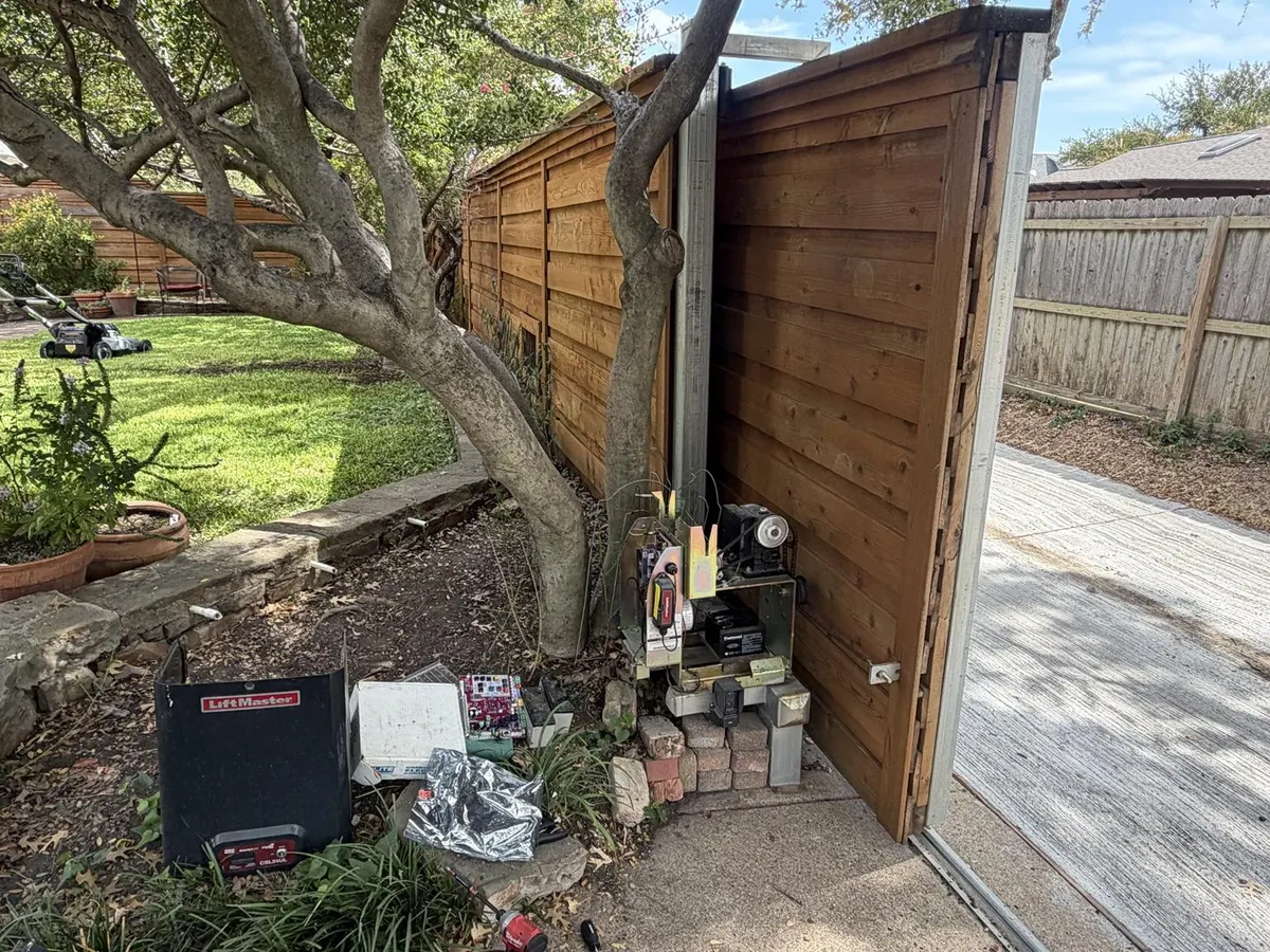 These photos show the LiftMaster sliding gate system after the circuit board and both 12V backup batteries were replaced, followed by programming, adjustment, and final testing.