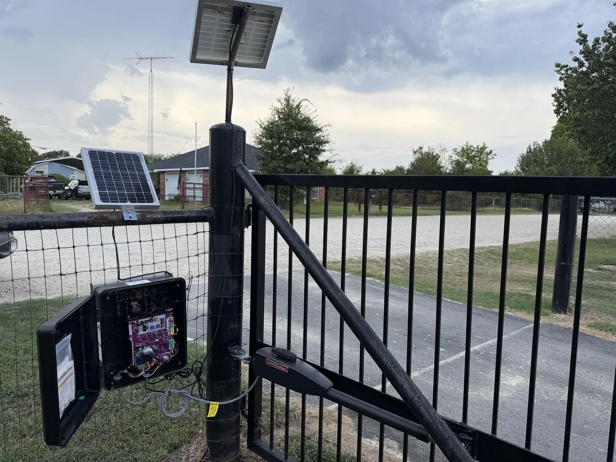 Solar panels and open control enclosure during the work.