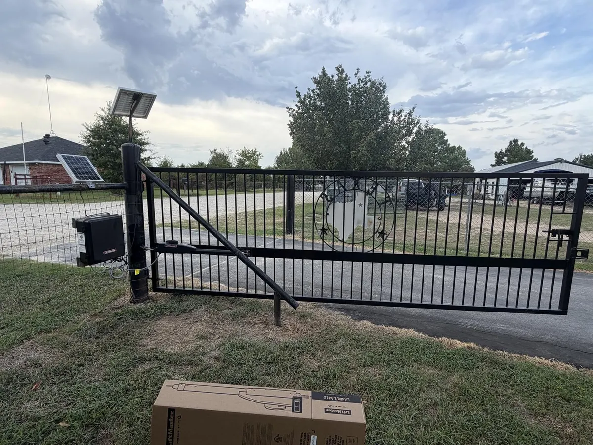 Gate and solar panel arrangement at the property.