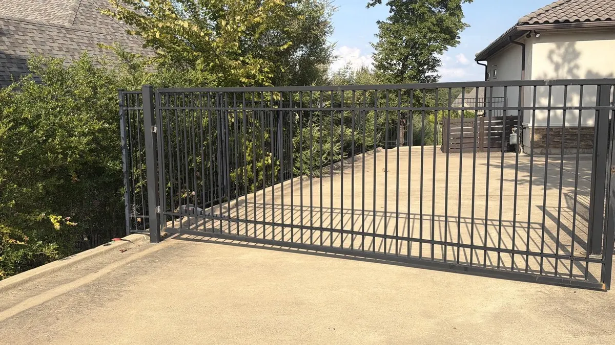 View of the swing gate and driveway.